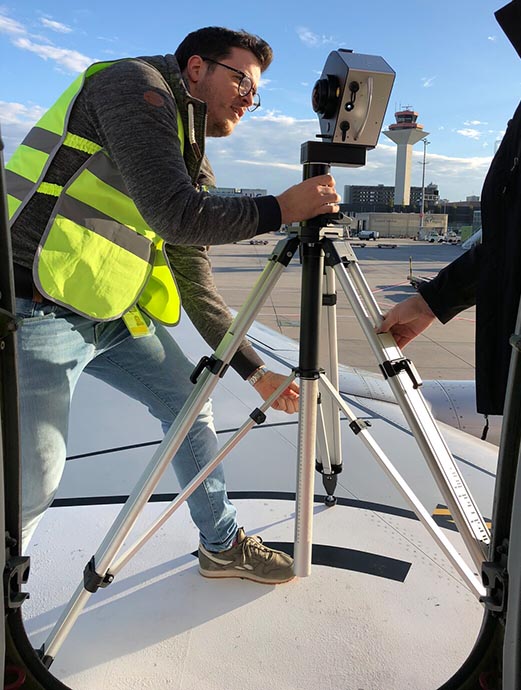 man adjusting civetta camera